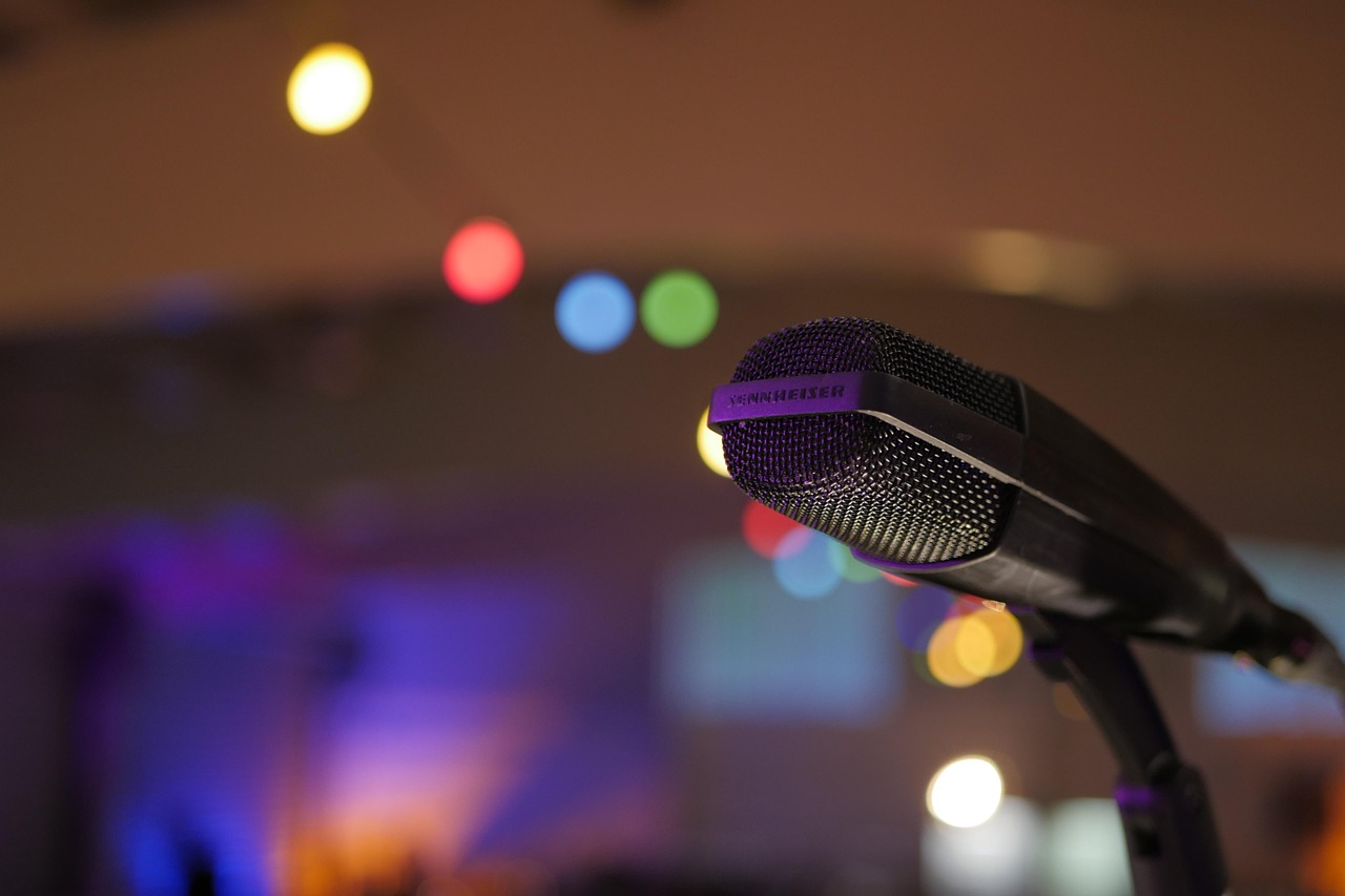 Microphone, garland, concert — The Evolution of Online Casinos: From Desktop to Mobile